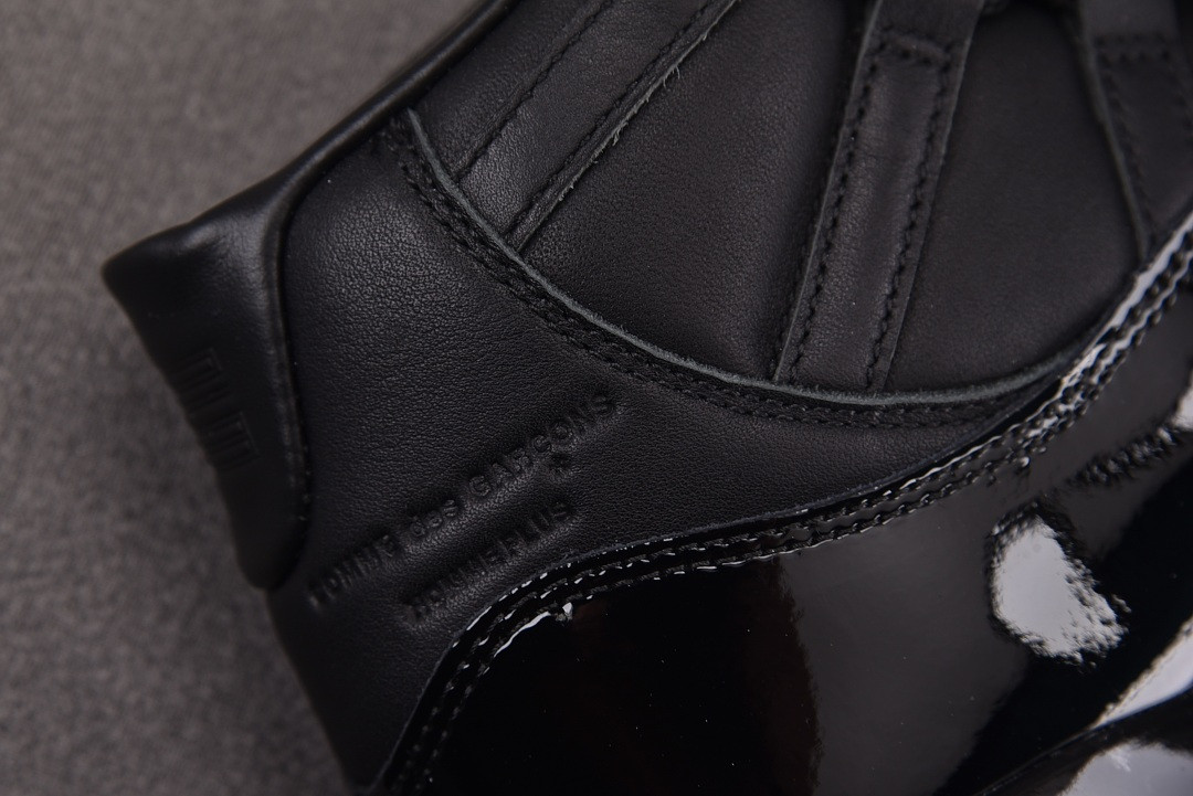 The CDG x Air Jordan 11 SP IV7639-001