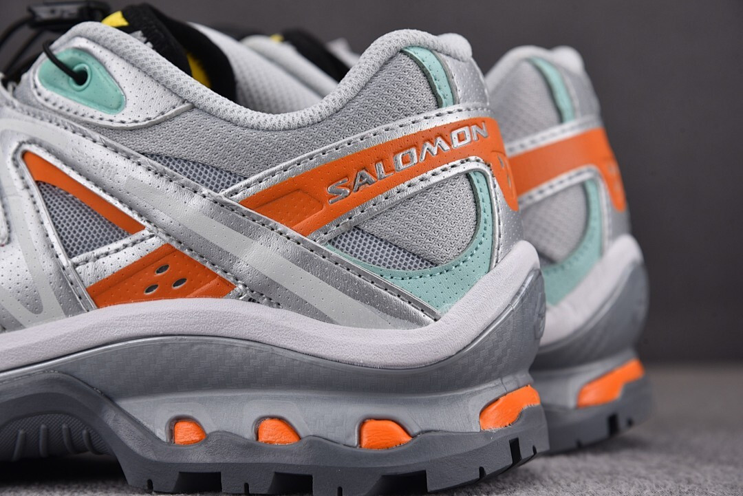 Salomon XT-Quest Adv The Br0k*n Arms "Silver/Orange" L4064270032