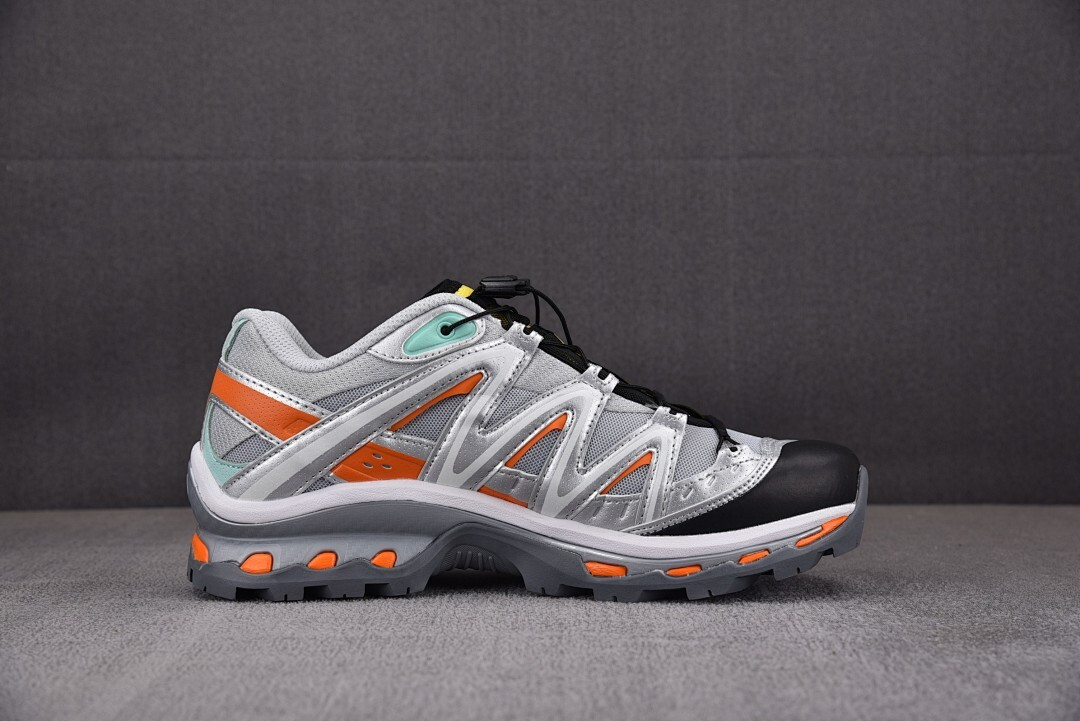Salomon XT-Quest Adv The Br0k*n Arms "Silver/Orange" L4064270032