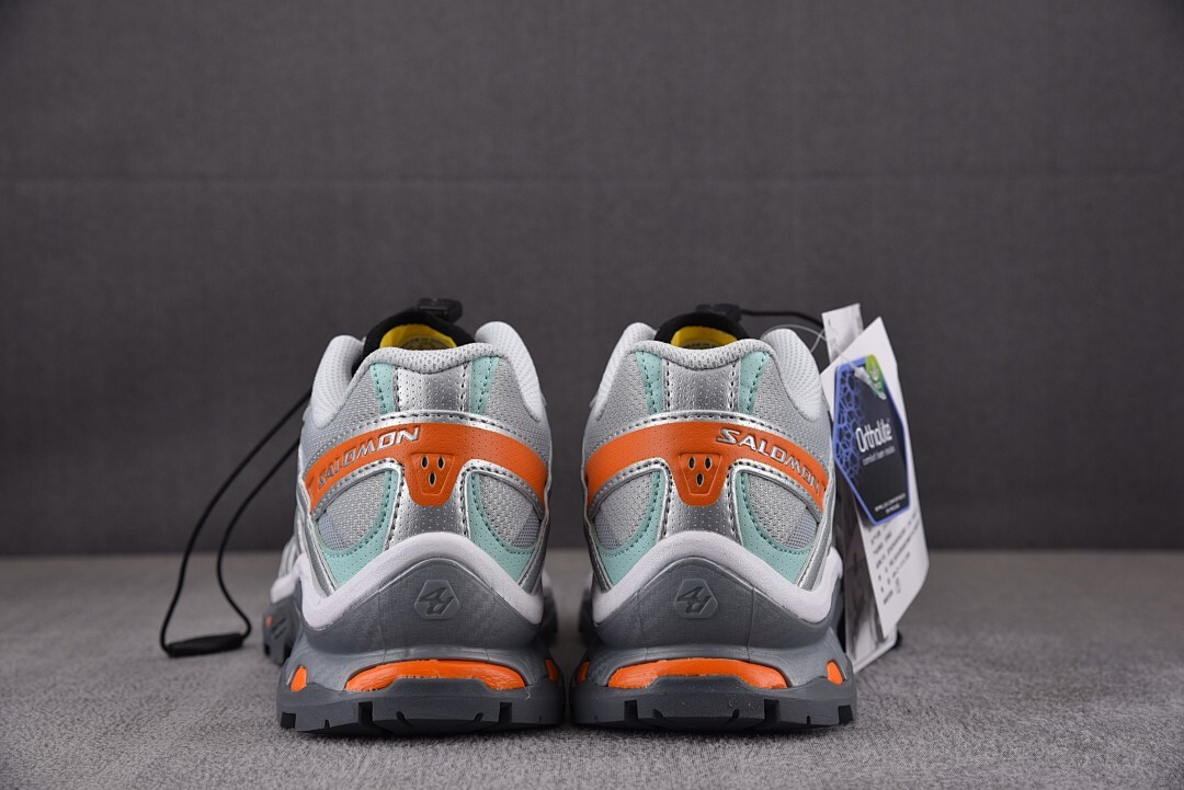 Salomon XT-Quest Adv The Br0k*n Arms "Silver/Orange" L4064270032