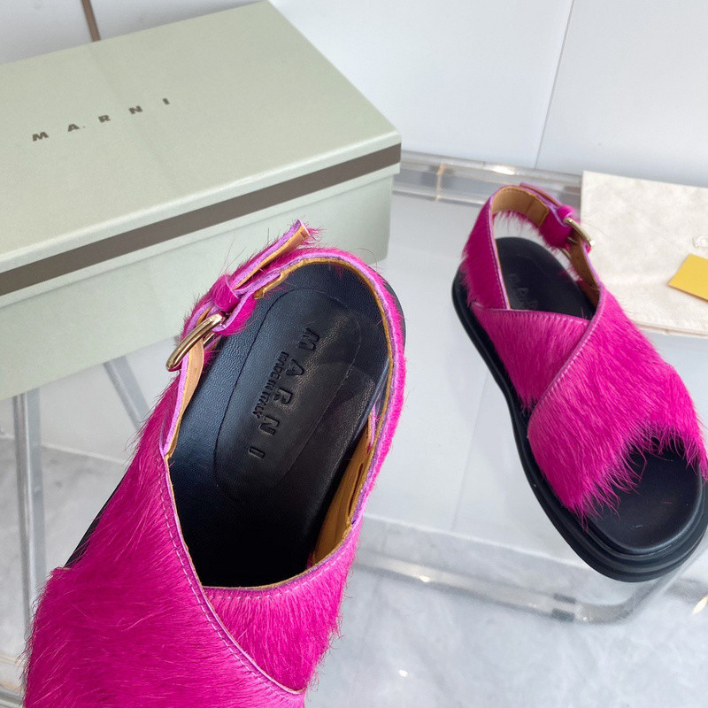 FUCHSIA LONG-HAIR CALFSKIN FUSSBETT