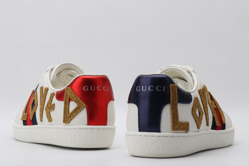 G*u*i sneakers
